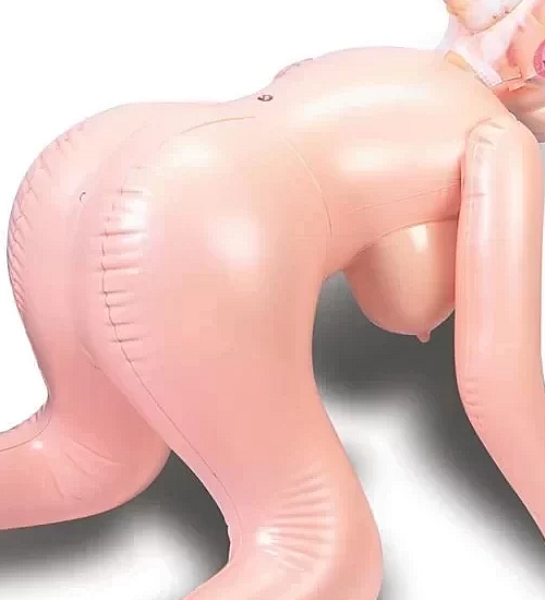 Dmuchana lalka w pozycji na pieska