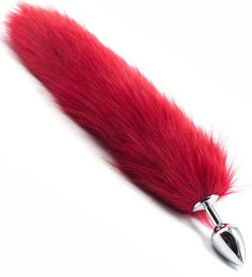 Plug z długim czerwonym ogonkiem